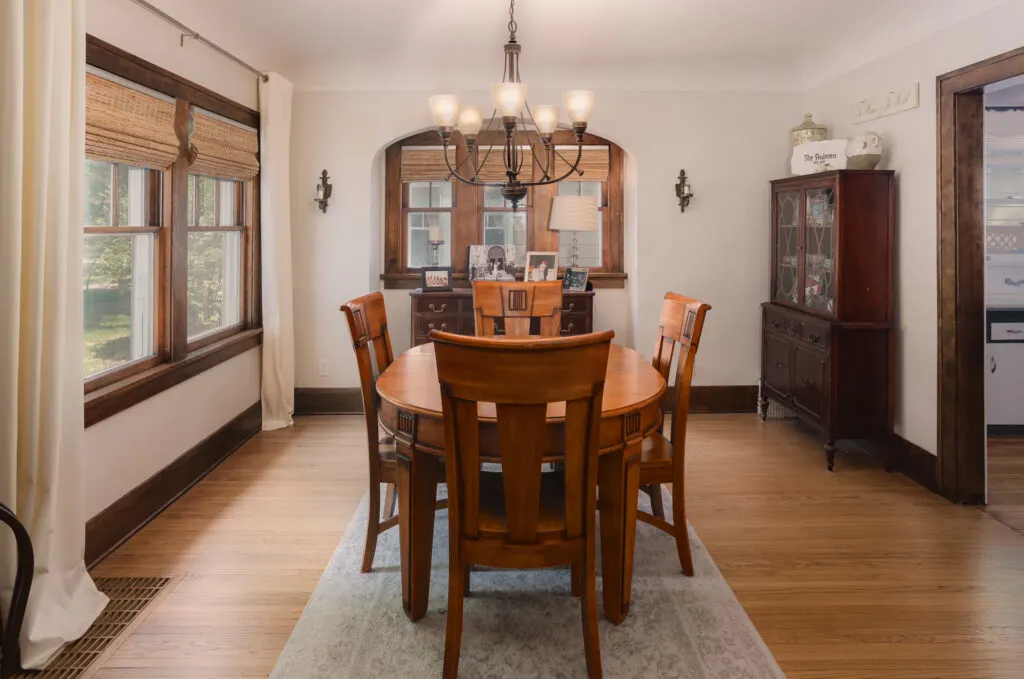 Dining room with restored wood floors and woodwork - Colonial home restoration