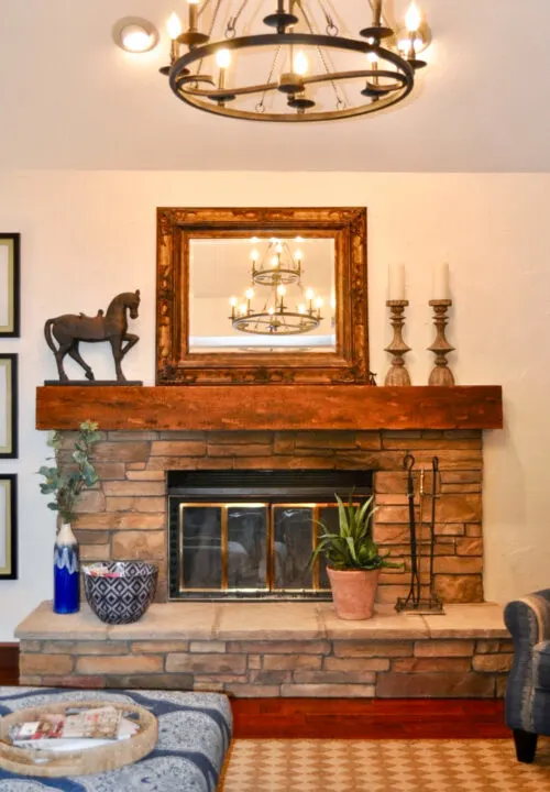 Vaulted ceiling family room staged with neutral decor and pops of blue