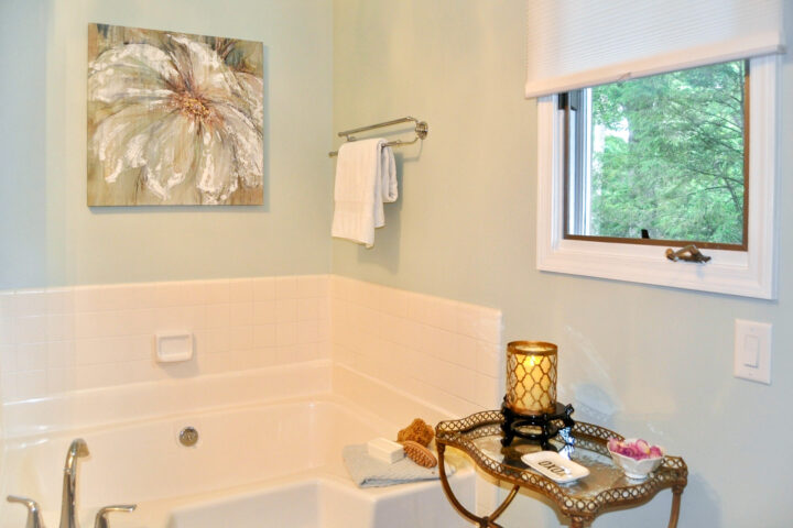 Pale blue bathroom staged to feel like a spa
