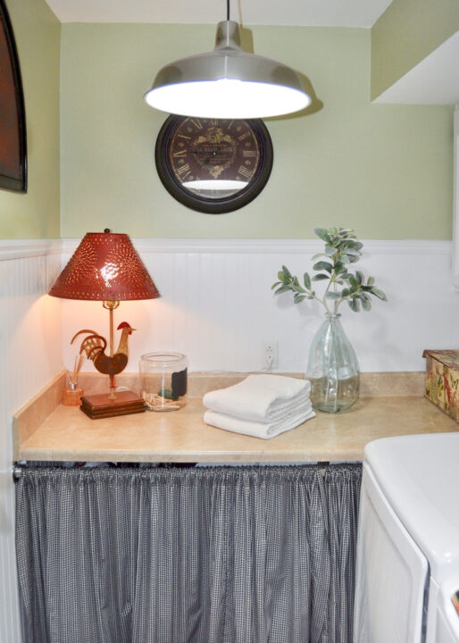 Clean and functional laundry room styled to sell quickly