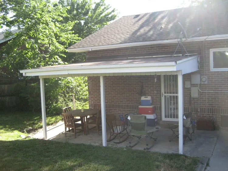 The old, rotten back porch at our first flip house