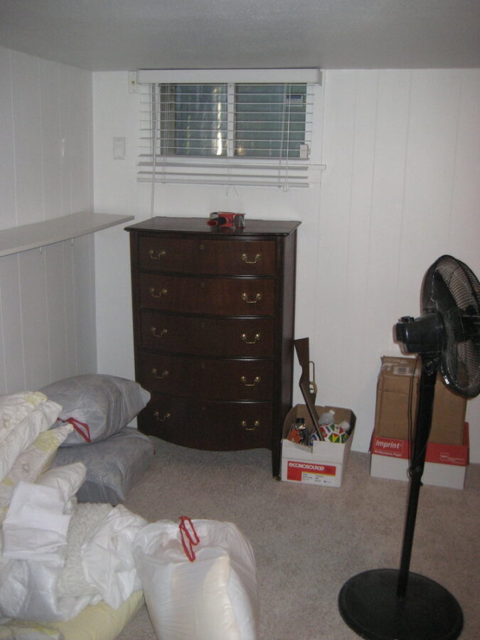 The basement bedroom was used for storage by previous owners