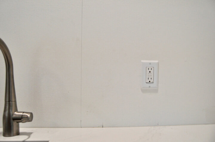 Begin backsplash tile installation at the center of the wall | Building Bluebird #kitchenrenovation