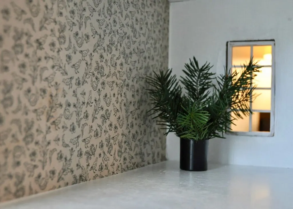 Bedroom with bird wallpaper & DIY plant