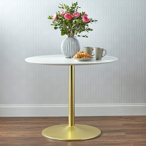 Round table from Overstock with glam fliar