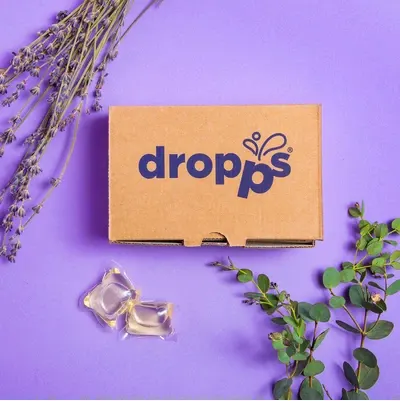 Use laundry detergent that comes in compostable packaging, like Dropps | Building Bluebird #sustainableliving #laundryroom