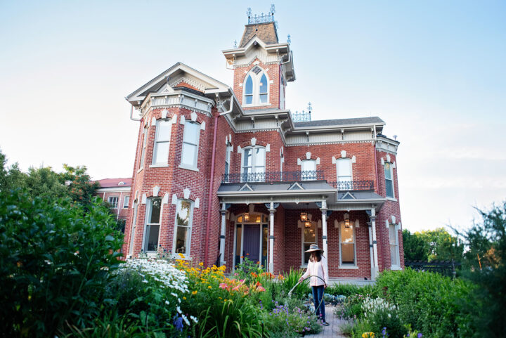 Historic Bosler House garden in Denver with pergola and English flowers