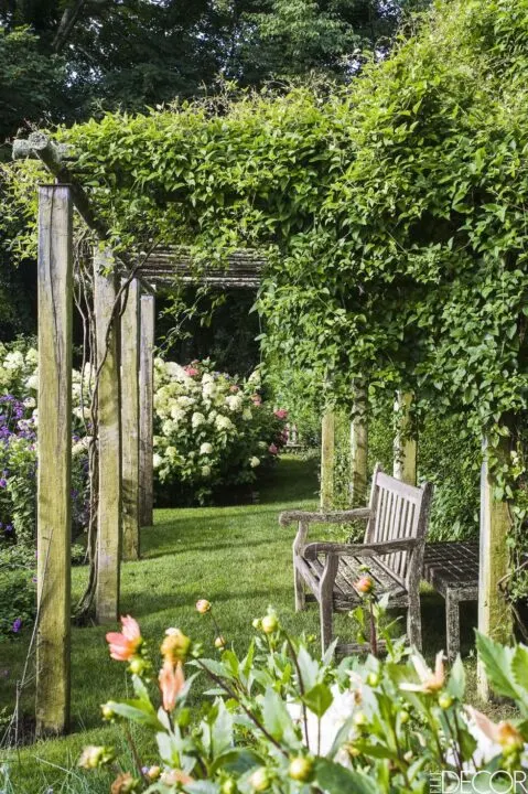Ina Garten's beautiful English garden bench and arbor | Building Bluebird #hydrangea #cottagecore #grandmillennial