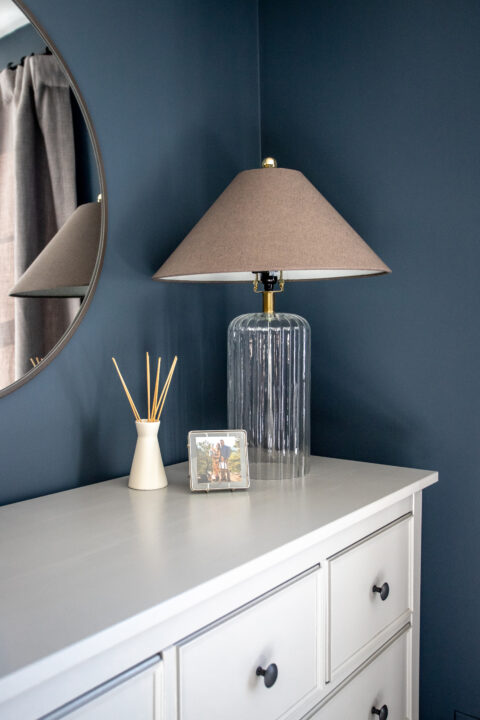 Modern lamp for the moody master bedroom makeover with a glass lamp base and RH Teen lampshade | Building Bluebird #bhgorc #rhteen #targetstyle #ikeahack #rustoleum