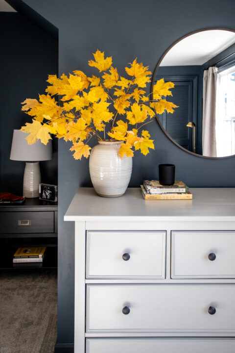 Fall foliage in a ceramic vase to compliment the dark walls and gray hemnes dresser | Building Bluebird #ikeahack #studiomcgee #targetstyle #styled #rustoleum