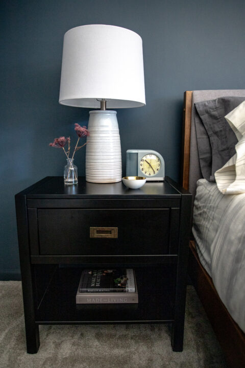 Simple nightstand decor with family photos for a personal touch | Building Bluebird #moodybedroom #moodypaint #bhgorc