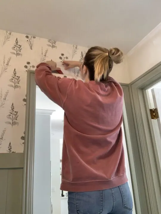 Step by step DIY on how to hang pre-pasted wallpaper in your home | Building Bluebird #homeimprovement #mudroommakeover #grandmillenial #cottagecore