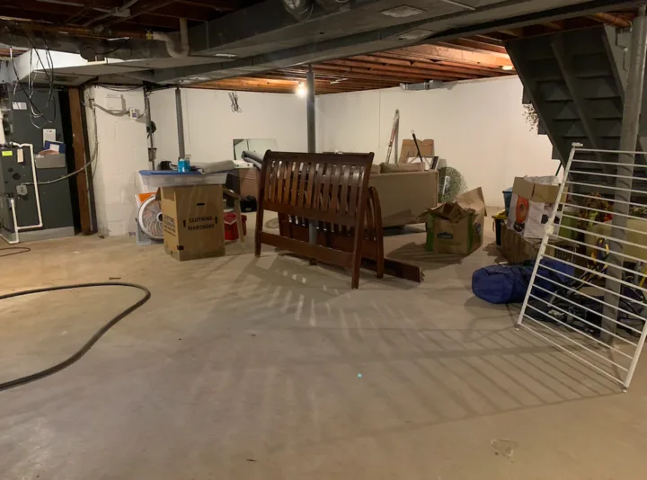 We transformed our unfinished basement into an additional flex living space | Building Bluebird
#basementmakeover #black ceiling #paintedfloors