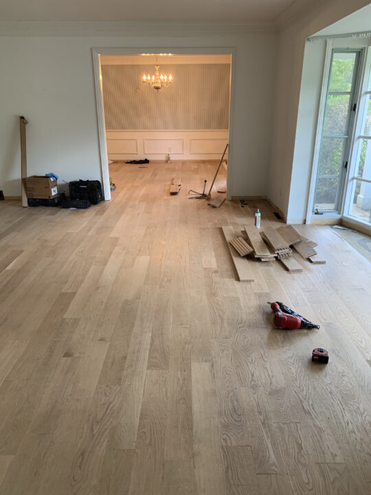Installing new floors and painting the living room for a fresh new look | Building Bluebird #orc #bhgorc #livingroommakeover