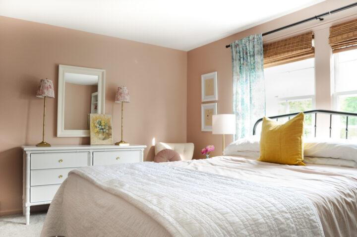 Vintage-inspired girls bedroom with neutral pink walls - Likeable Sand by Sherwin Williams | Building Bluebird