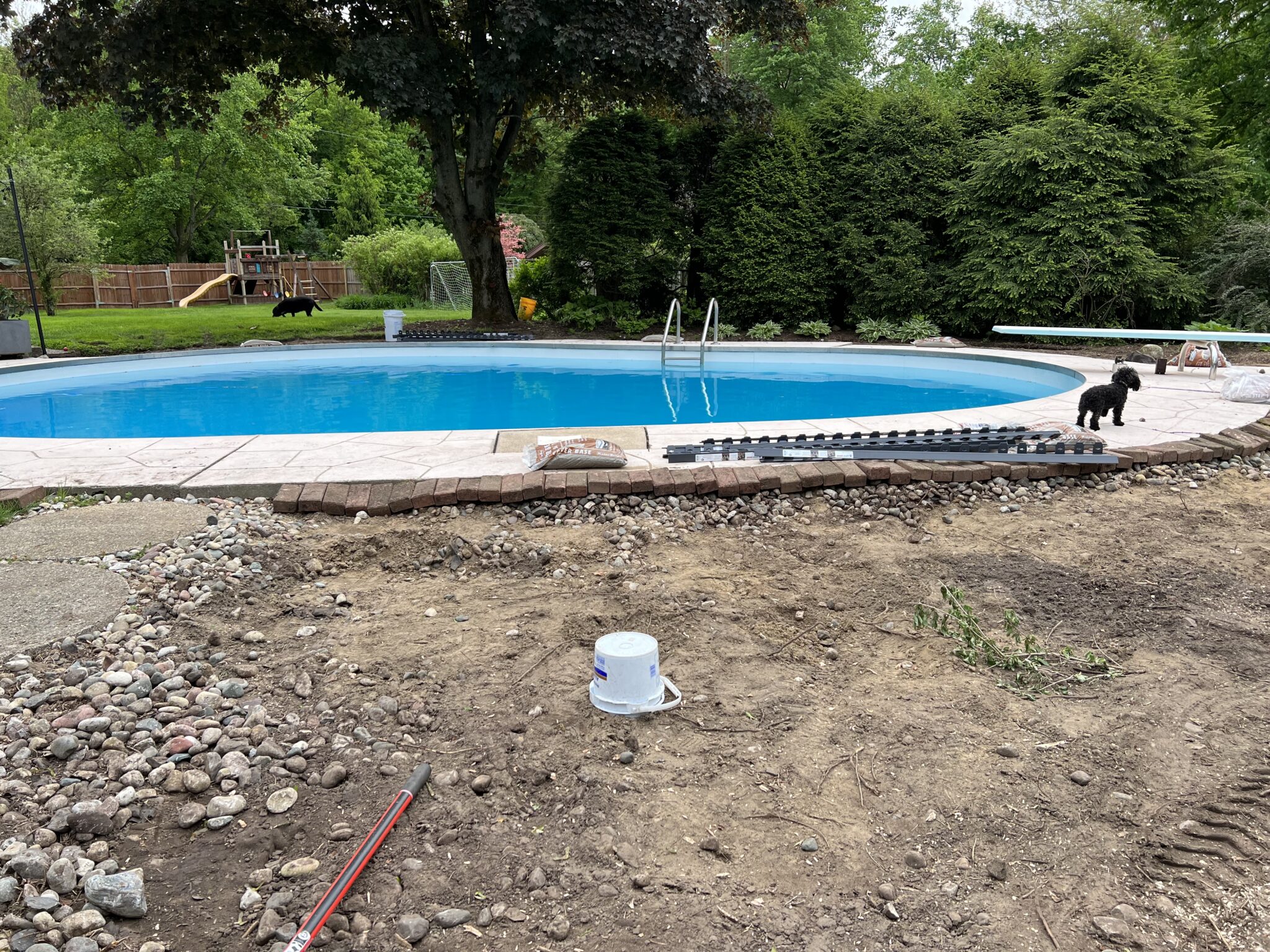 How to Install Brick Edging Around a Patio Building Bluebird