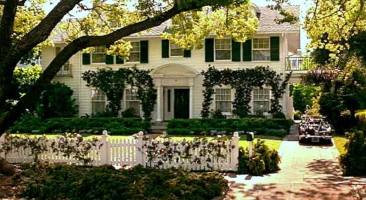 Father of the bride classic colonial house with green shutters